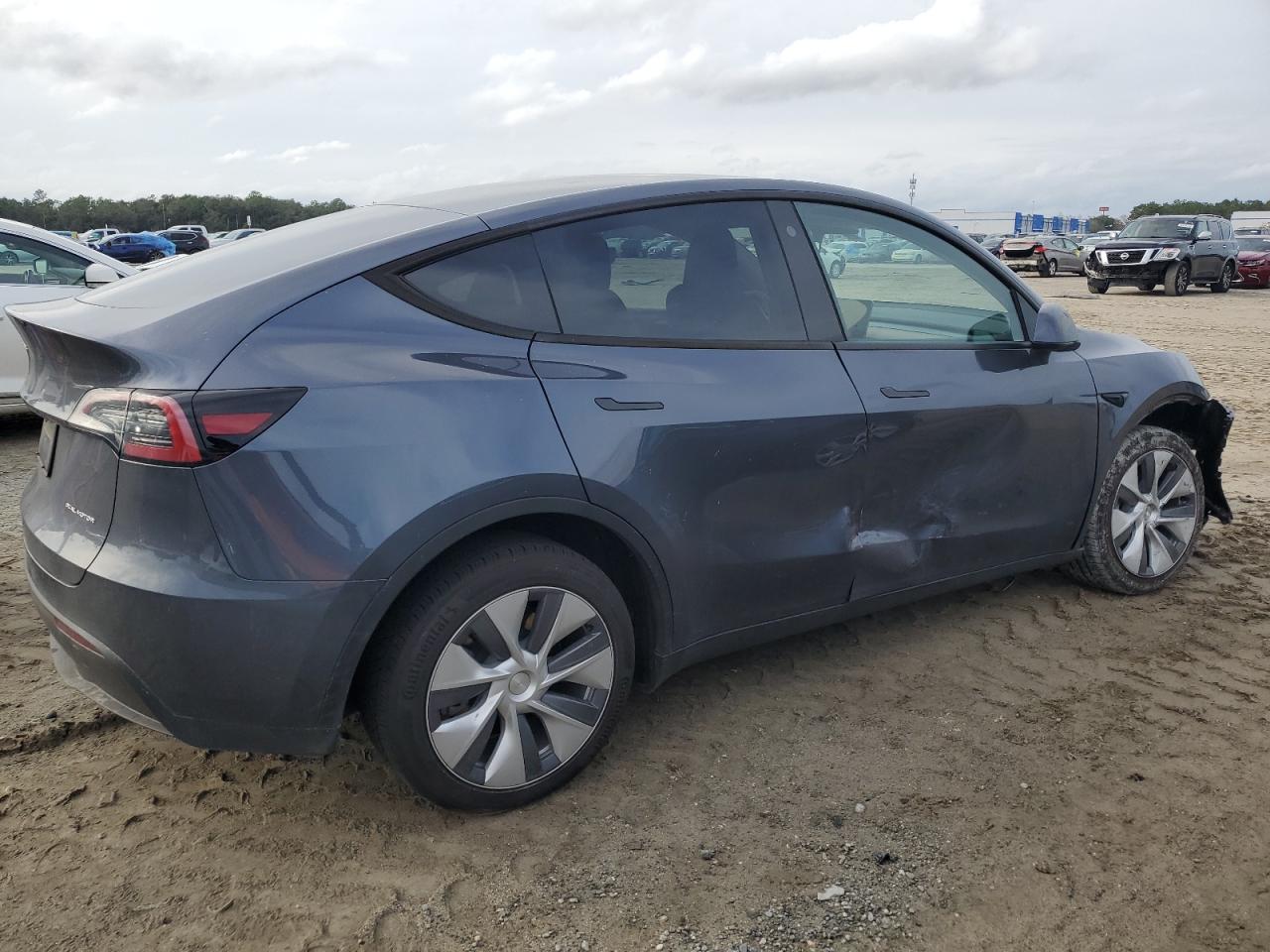 7SAYGDEE4PA058599  tesla model y 2023 IMG 2