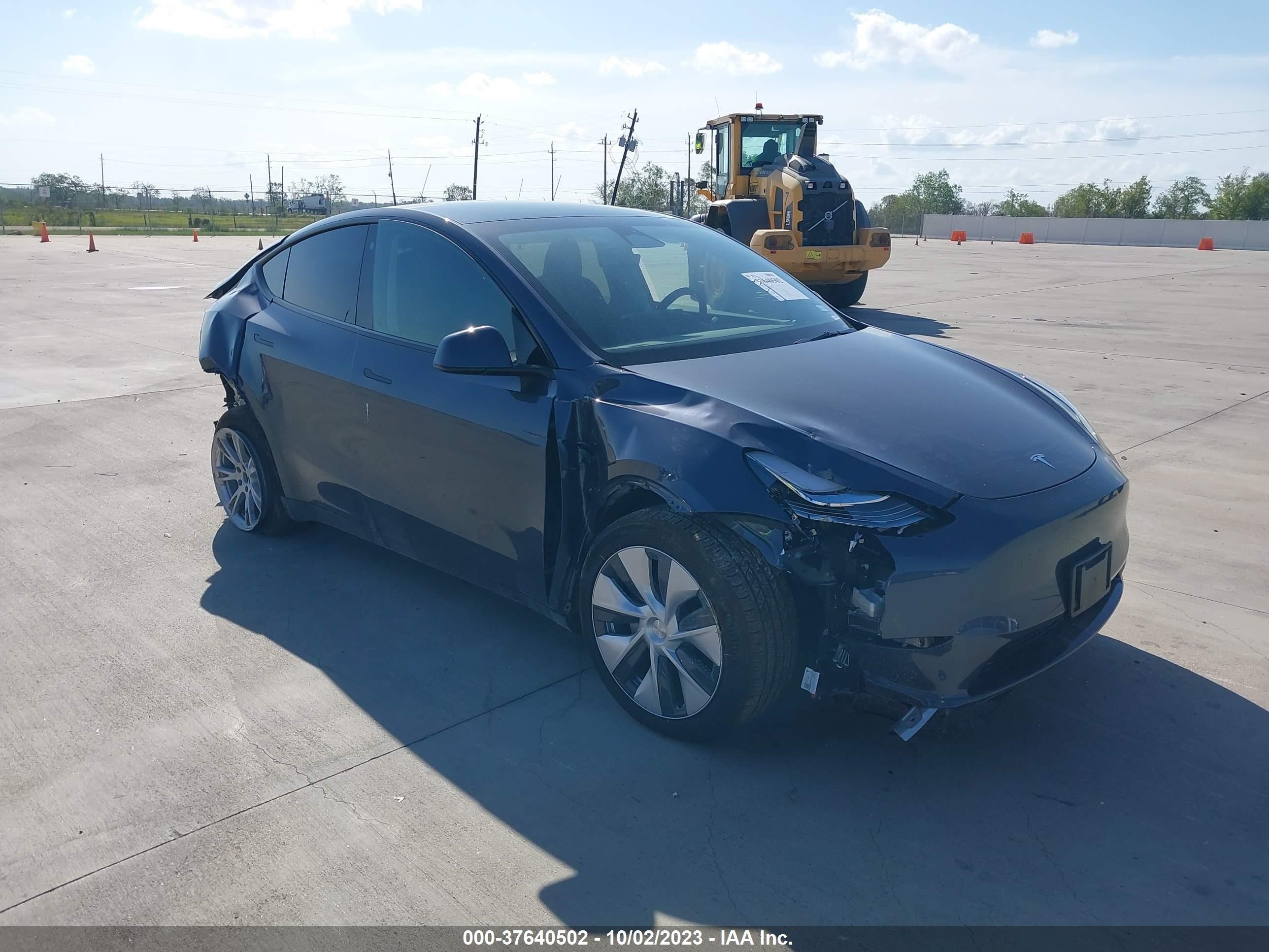 7SAYGDEE6PA090230  tesla model y 2023 IMG 0