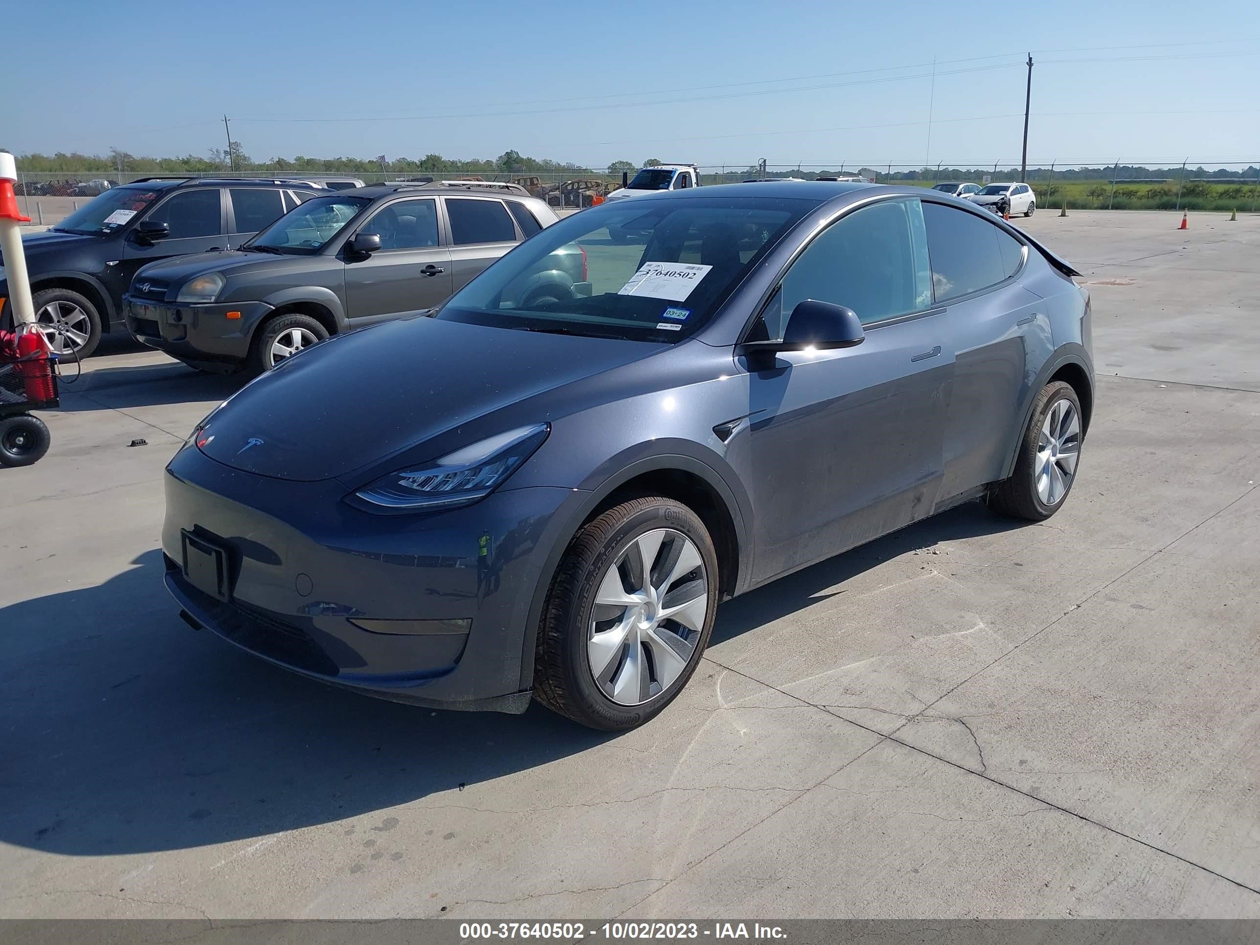 7SAYGDEE6PA090230  tesla model y 2023 IMG 1