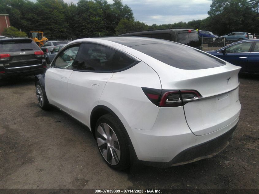 7SAYGDEE6PA115904  tesla model y 2023 IMG 2