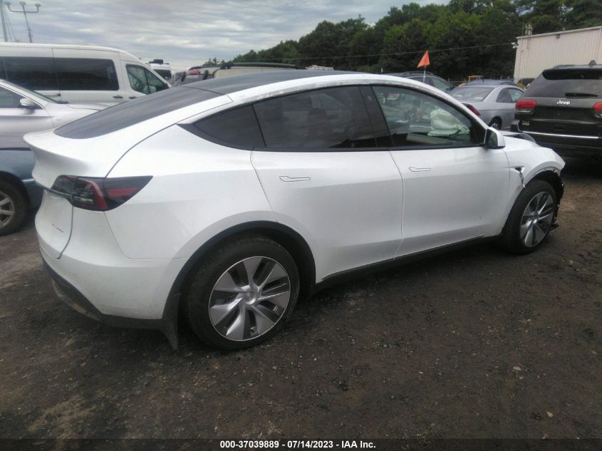 7SAYGDEE6PA115904  tesla model y 2023 IMG 3