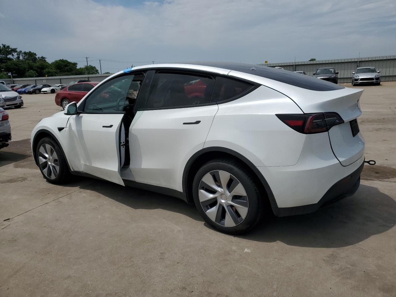 7SAYGDEE8PA128797  tesla model y 2023 IMG 1