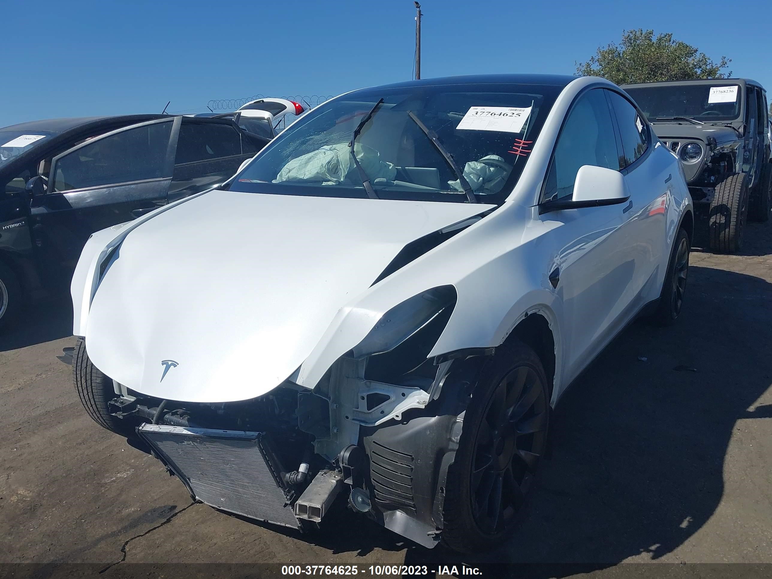 7SAYGDEE9PA059084  tesla model y 2023 IMG 1