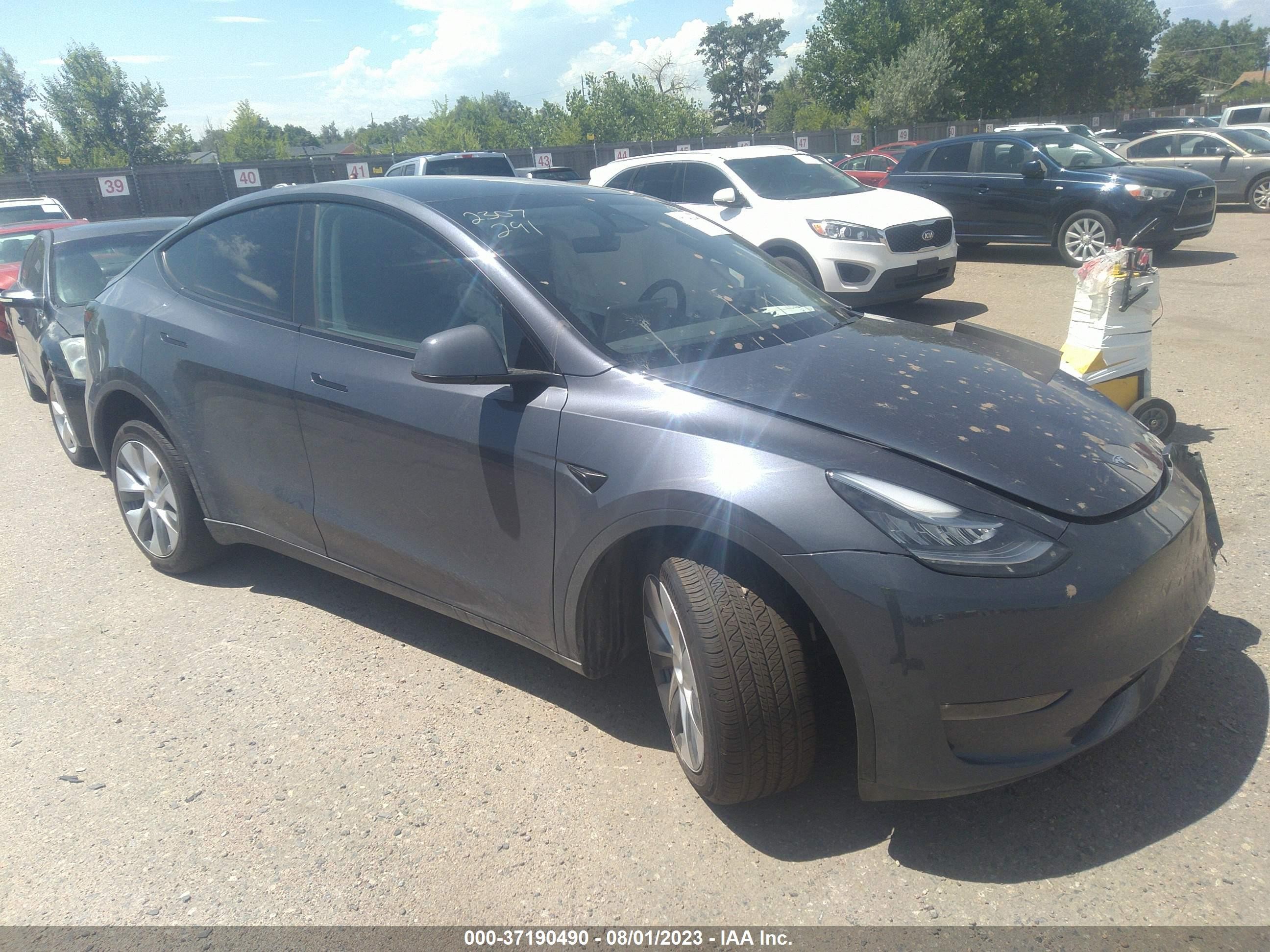 7SAYGDEE9PA137203  tesla model y 2023 IMG 0