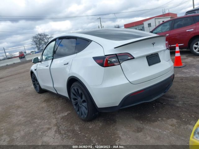 7SAYGDEF5PF779865  tesla model y 2023 IMG 2