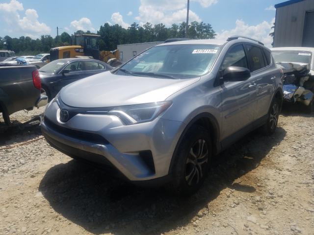 2T3ZFREV7HW343622  toyota rav4 2017 IMG 1