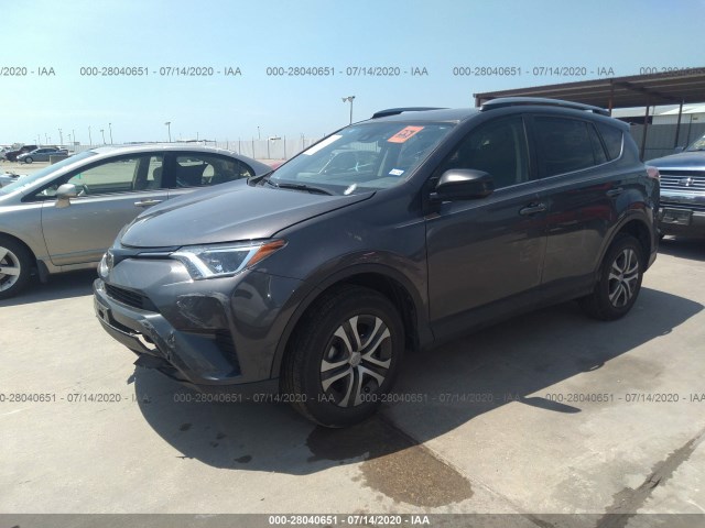 JTMZFREV2JJ167373  toyota rav4 2018 IMG 1