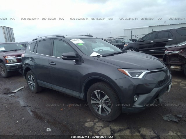 2T3RFREV4JW750075  toyota rav4 2018 IMG 0