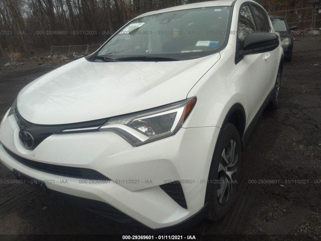 JTMBFREV8JJ259265  toyota rav4 2018 IMG 1