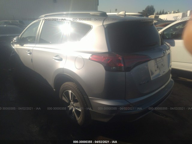 JTMWFREV2JJ182393  toyota rav4 2018 IMG 2