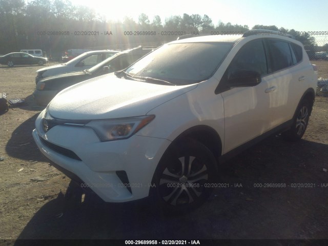 JTMZFREV1JJ735130  toyota rav4 2018 IMG 1